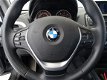 BMW 1-serie - 116d EDE Corporate Lease Executive Sport 5-Drs. Xenon Navigatie CruiseControl 18`lm 15 - 1 - Thumbnail