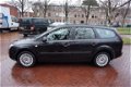 Ford Focus Wagon - 1.4-16V Ambiente bij 153.512 km nieuw distributieriem gedaan - 1 - Thumbnail