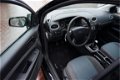 Ford Focus Wagon - 1.4-16V Ambiente bij 153.512 km nieuw distributieriem gedaan - 1 - Thumbnail