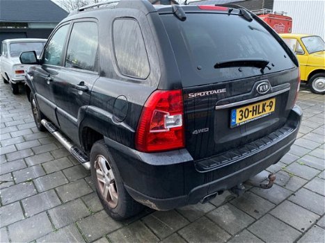 Kia Sportage - 2.0 CVVT X-ecutive 4WD - 1