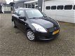 Suzuki Swift - 1.2 EXCLUSIVE, 5 deurs airco - 1 - Thumbnail