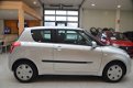 Suzuki Swift - 1.3 Comfort [ AIRCO | DEALER ONDERHOUDEN | LAGE KILOMETER ] - 1 - Thumbnail