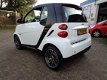 Smart Fortwo coupé - 1.0 PURE / AUTOMAAT / AIRCO / ELEK RMN / C.VERGR.AFSTAND / 15 INCH LM VLG / RAD - 1 - Thumbnail