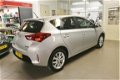 Toyota Auris - 1.3 Now 5Drs, Airco. 77.000 KM NL auto met NAP - 1 - Thumbnail