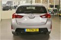 Toyota Auris - 1.3 Now 5Drs, Airco. 77.000 KM NL auto met NAP - 1 - Thumbnail