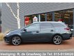 Toyota Auris Touring Sports - 1.8 Hybrid Aspiration | Cruise control | Climate control | safety sens - 1 - Thumbnail