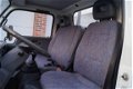 Nissan Cabstar E - 75.28-290 2.3D 3 Zits, PickUp, Laadbak 3.65 m, Trekhaak - 1 - Thumbnail