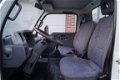 Nissan Cabstar E - 75.28-290 2.3D 3 Zits, PickUp, Laadbak 3.65 m, Trekhaak - 1 - Thumbnail