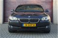 BMW 5-serie Touring - 520d High Executive Xenon, Elektrische trekhaak, M-sportstuur, Panoramadak, Gr - 1 - Thumbnail