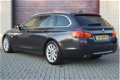BMW 5-serie Touring - 520d High Executive Xenon, Elektrische trekhaak, M-sportstuur, Panoramadak, Gr - 1 - Thumbnail
