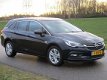 Opel Astra Sports Tourer - 1.4 Turbo Cosmo Automaat/ECC/Navigatie/Camera/LEER - 1 - Thumbnail