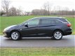 Opel Astra Sports Tourer - 1.4 Turbo Cosmo Automaat/ECC/Navigatie/Camera/LEER - 1 - Thumbnail