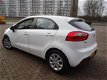 Kia Rio - 1.2 CVVT Comfort Pack + Airco - 1 - Thumbnail