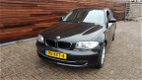 BMW 1-serie - 116i Business Line zwart mettalic - 1 - Thumbnail