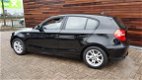 BMW 1-serie - 116i Business Line zwart mettalic - 1 - Thumbnail