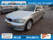 BMW 1-serie - 120i High Executive , AIRCO, NAVI, CRUISE CONTROLE, 15-08-2020 5 DEURS, NETTE 120i , S - 1 - Thumbnail