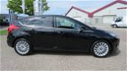 Ford Focus - 1.0 125 pk Titanium 5 drs, Trekhaak, Parking Pack, Xenon, 54366 km - 1 - Thumbnail