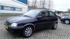 Opel Corsa - 1.0i-12V Strada Zwart - 1 - Thumbnail