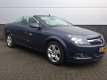 Opel Astra TwinTop - 1.6 Enjoy Airco, volledig dealeronderhouden, Distr. riem in 2019 vervangen - 1 - Thumbnail