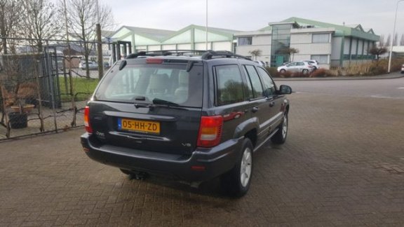 Jeep Grand Cherokee - Grand-cherokee 4.7 V8 Limited met trekhaak 1e eigenaar - 1