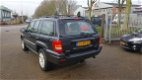 Jeep Grand Cherokee - Grand-cherokee 4.7 V8 Limited met trekhaak 1e eigenaar - 1 - Thumbnail