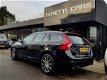 Volvo V60 - 2.4 D6 AWD R-DESIGN PLUG-IN HYBRID AUT6 SCHUIFDAK LEDER CAMERA XENON LMV PDC - 1 - Thumbnail