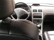 Peugeot 307 - 1.6-16V Gentry Goudkleurige ruime peugeot met wat gebruikerssporen - 1 - Thumbnail