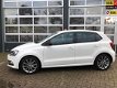 Volkswagen Polo - 1.2 TSI Highline - 1 - Thumbnail