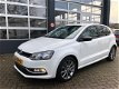 Volkswagen Polo - 1.2 TSI Highline - 1 - Thumbnail