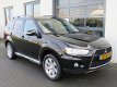 Mitsubishi Outlander - 2.4 Instyle 4WD Automaat 7-pers. Dealer onderhouden Navi Trekhaak NL Auto NAP - 1 - Thumbnail