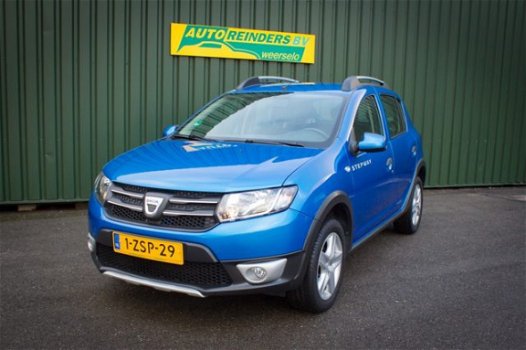 Dacia Sandero - Stepway TCe 90pk + Navi / Airco / Cruise / Zeer mooi - 1