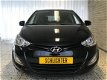 Hyundai i20 - 1.2 i-Deal 5 Deurs/Airco/Cruise/Lm-velgen/Radio cd - 1 - Thumbnail