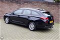 Hyundai i30 - 1.4 T-GDI 140PK Comfort nav/dab/cam/trekhaak/lmv15 - 1 - Thumbnail