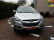 Hyundai ix35 - 2.0i Dynamic Automaat - 1 - Thumbnail