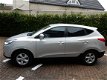 Hyundai ix35 - 2.0i Dynamic Automaat - 1 - Thumbnail