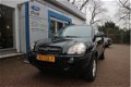 Hyundai Tucson - 2.0i 140pk 4WD Style met Leer & Trekhaak - 1 - Thumbnail