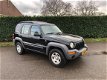 Jeep Cherokee - 2.5 CRD 143PK SPORT AC GRIJS KENTEKEN - 1 - Thumbnail