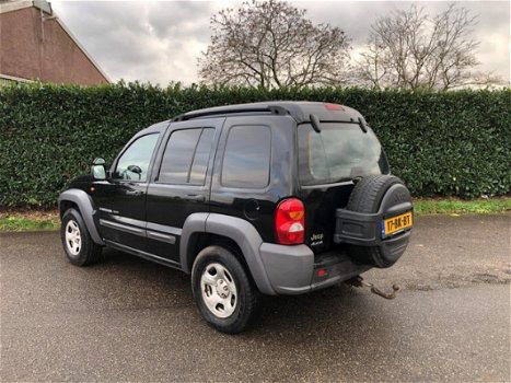 Jeep Cherokee - 2.5 CRD 143PK SPORT AC GRIJS KENTEKEN - 1