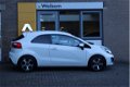 Kia Rio - 1.4 CVVT Plus Pack Navigatie Cruise Controle, Airco - 1 - Thumbnail