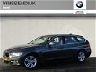 BMW 3-serie Touring - 320i Executive Sport Line | Sportstoelen | Navigatie | Parkeer sensoren achter - 1 - Thumbnail