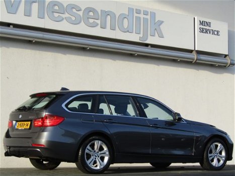 BMW 3-serie Touring - 320i Executive Sport Line | Sportstoelen | Navigatie | Parkeer sensoren achter - 1