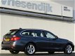 BMW 3-serie Touring - 320i Executive Sport Line | Sportstoelen | Navigatie | Parkeer sensoren achter - 1 - Thumbnail