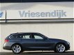 BMW 3-serie Touring - 320i Executive Sport Line | Sportstoelen | Navigatie | Parkeer sensoren achter - 1 - Thumbnail