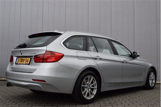 BMW 3-serie Touring - 320i Automaat High Executive Zwart Leder, Bi-Xenon, Sportstoelen, Full Map Nav - 1