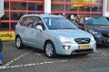 Kia Carens - 2.0 CVVT EX 7p. automaat - 1 - Thumbnail