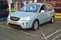 Kia Carens - 2.0 CVVT EX 7p. automaat - 1 - Thumbnail