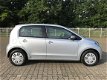 Volkswagen Up! - MOVE-UP 1.0i 5DR AIRCO NAVIGATIE EL.RAMEN SLOTVER GRENDELING OP AFSTAND BLUETOOTH B - 1 - Thumbnail