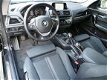 BMW 1-serie - 118d Sport LED Navigatie Clima PDC Actie - 1 - Thumbnail