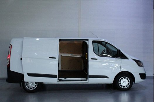 Ford Transit Custom - 2.0 TDCi 130pk L2H1 Trend Cruise, Airco, Bluetooth, Elek. Pakket, PDC V+A - 1