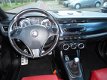 Alfa Romeo Giulietta - 1.4 Turbo MultiAir 170pk Distinctive. Rood leer - 1 - Thumbnail